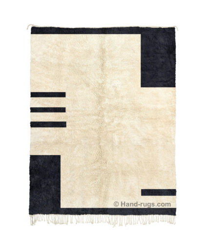 Black and cream area rug with geometric design